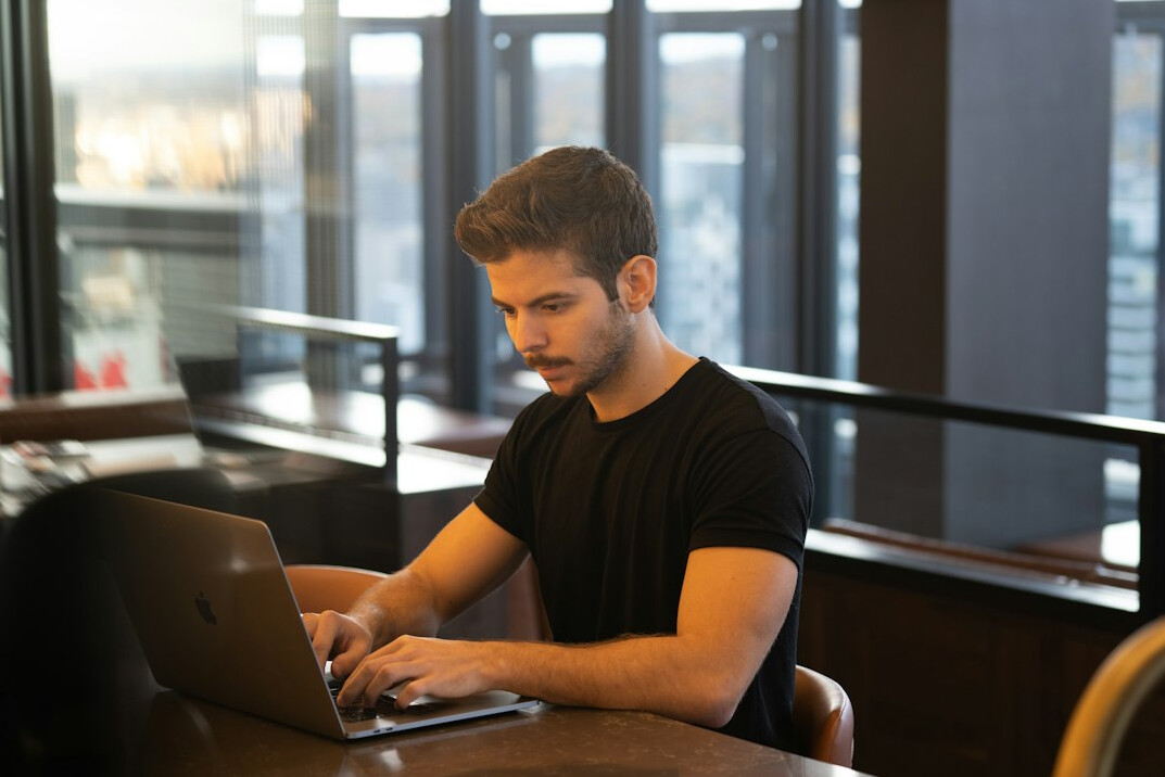 coding on laptop