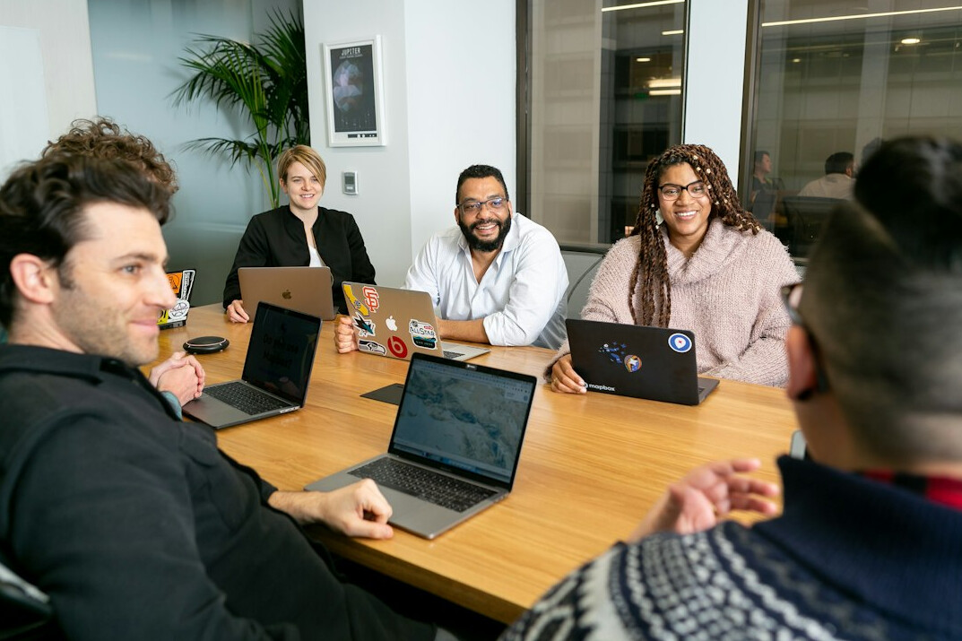 business team meeting about software