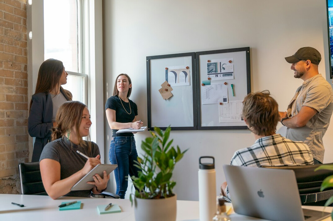 corporate team collaborating on project